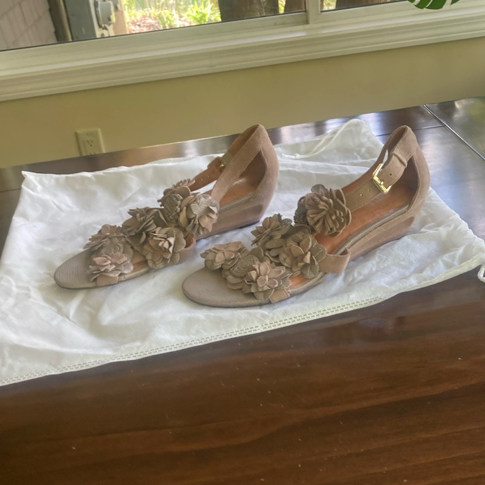 Suede taupe low heeled  sandles.  Flower decorative detail on straps.
